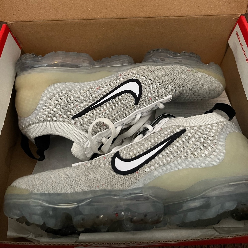 Air VaporMax women’s size 5.5, kids 3.5.